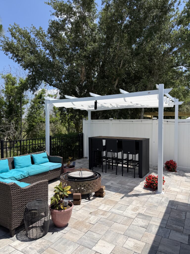 Pergola securely anchored through pavers in Saint Cloud
