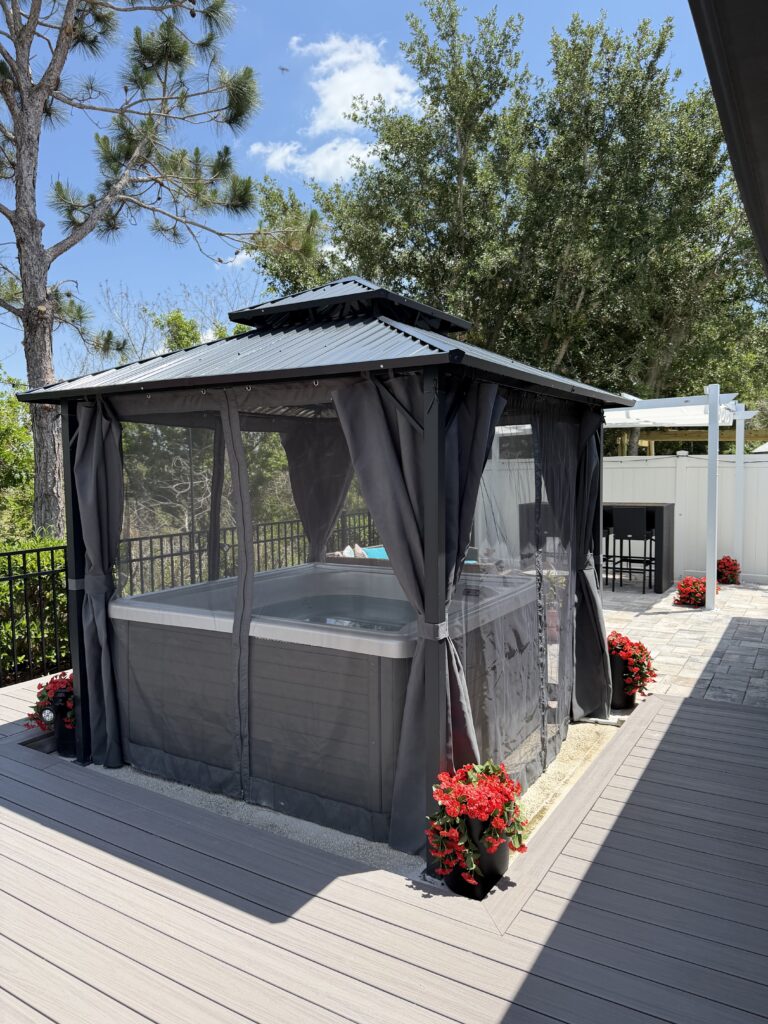 Hardtop gazebo over hot tub on concrete slab in Saint Cloud