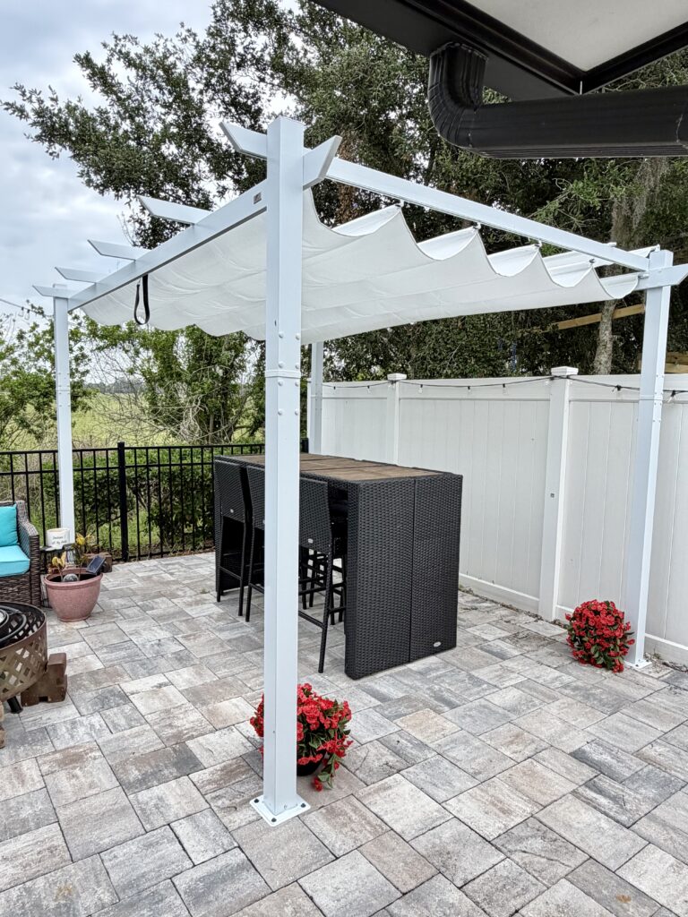 Pergola installed on paver patio in Saint Cloud