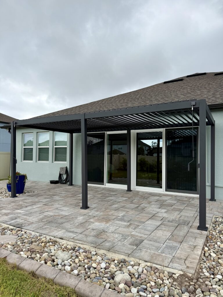 Oviedo – Mirador Louvered Pergola Installation with Concrete Footings